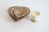 Wooden heart stacking bowls and Braveworks Soy Candle.