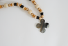 Gold, cream, and black chunky necklace.