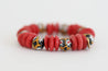 Handmade beaded chunky stretch bracelet with red Ashanti recycled glass saucer beads and multi-colored recycled glass krobo beads