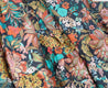 Soft, multicolor floral jewel tone wrap skirt against a navy background