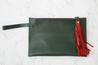Leather wristlet with tassel