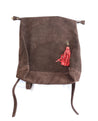 Ethically sourced large suede backpack with sheepskin leather tassel handmade by artisans overcoming poverty in Ethiopia