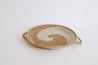 Handwoven tan and cream basket, fair trade decor from Rwanda.