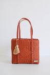 Medium size recycled tote in terracotta color.