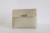 Recycled plastic clutch in white and sand made in Guatemala.