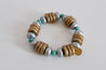 Handcrafted bracelet with metallic beads and artisan design.