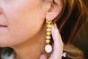 yellow and green beaded earrings with marble pendant