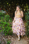 floral pattern wrap skirt in pink, purple, and orange hues
