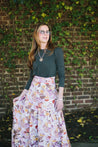 long tiered wrap skirt in pink, purple, and oranges