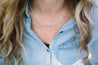 white and light green beaded necklace