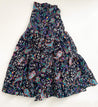 Festive wrap skirt with black background and colorful paisley and floral pattern sewn in the USA