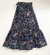 Festive wrap skirt with black background and colorful paisley and floral pattern sewn in the USA