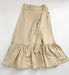 Textured 100% cotton, cream-colored wrap skirt with one tier at the bottom sewn in the USA