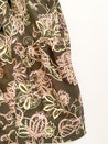 100% cotton wrap skirt with a brown, tan and lavender floral design sewn in the USA