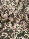 100% cotton wrap skirt with a brown, tan and lavender floral design sewn in the USA