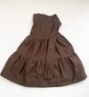 100% cotton wrap brown skirt with subtly brown floral pattern sewn in the USA