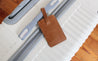 Leather luggage tag in brown from Ethiopia.