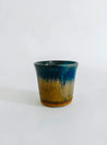 Handmade handleless ceramic mug