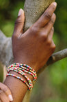 stacked colorful beaded bracelets