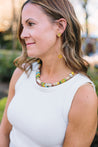 light dangle earrings with yellow bead at the bottom