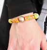 wood and glass beaded bracelet in green and red pattern