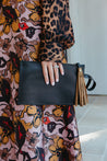 Leather wristlet with tassel