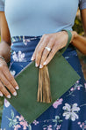 Leather wristlet with tassel