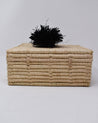 Hand-woven decorative and sustainably storage basket with fun pom pom on top